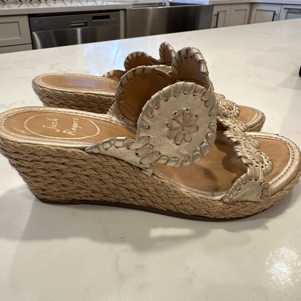 Jack Roger’s gold medallion espadrilles